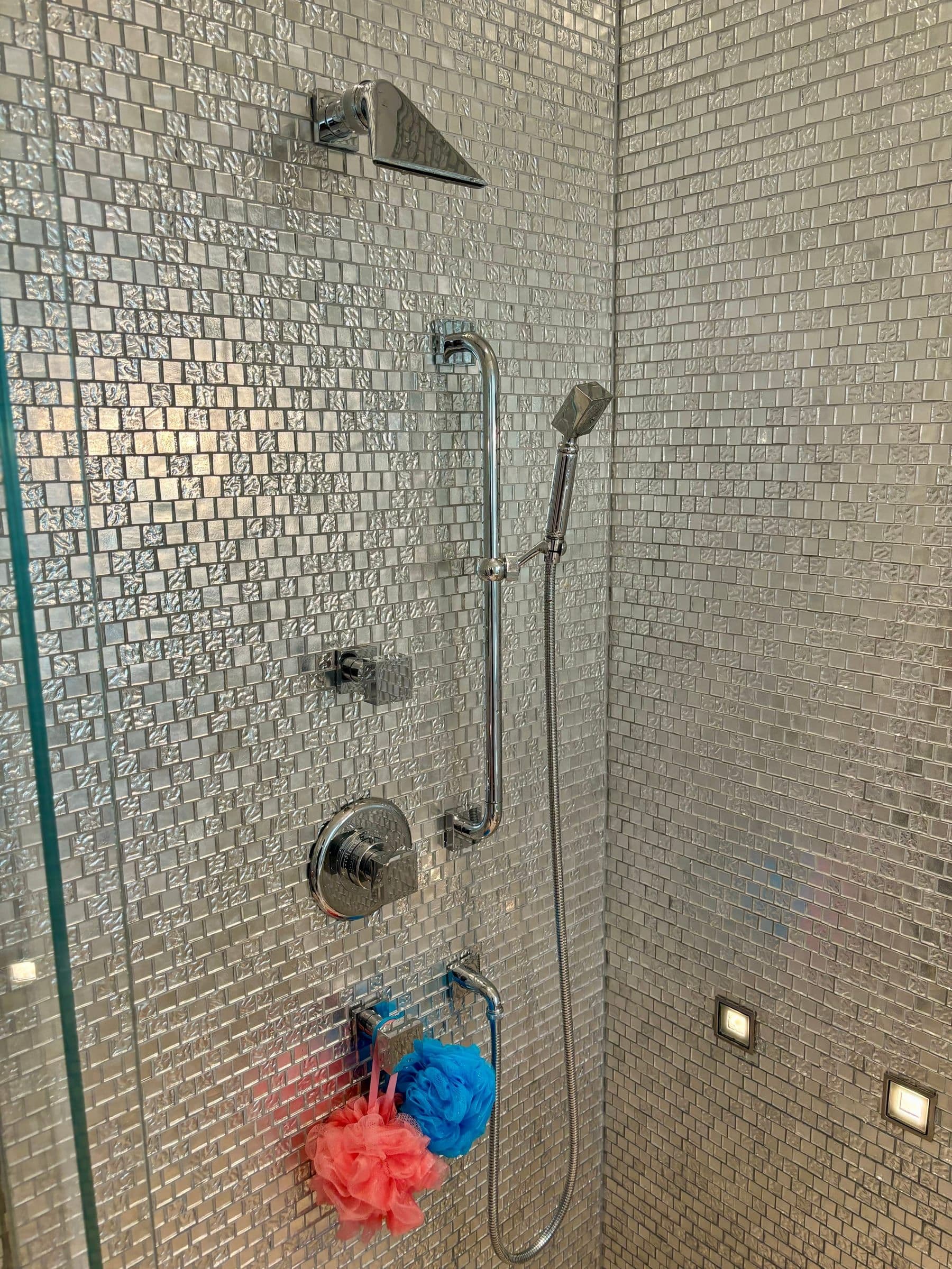 Completed metallic mosaic tile shower system by LR Plumbing in Toronto